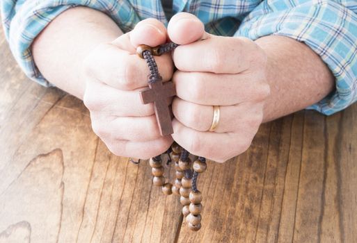 Woman with Rosary Beads in Her Hands