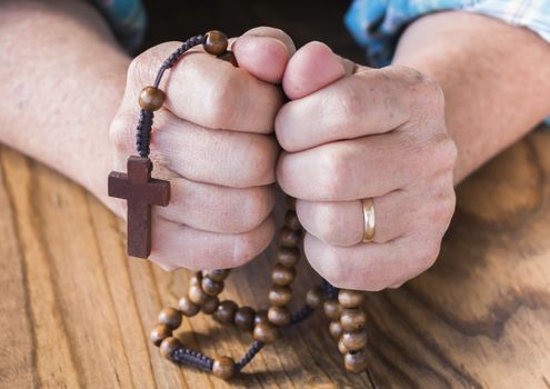 Woman with Rosary Beads in Her Hands