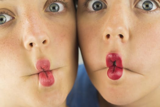 Two Cute Young Girls together Doing Fishlips