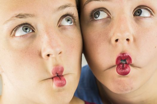 Two Cute Young Girls together Doing Fishlips