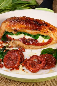 Stuffed breast baked with dried tomatoes, mozzarella, spinach