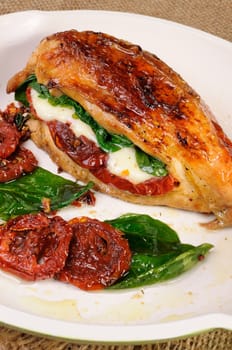 Stuffed breast baked with dried tomatoes, mozzarella, spinach