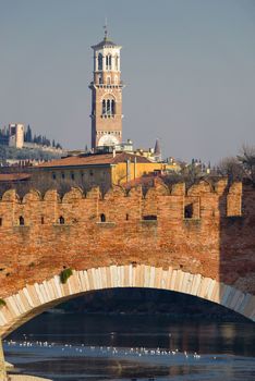 View over the medieval bridge and tower in Verona