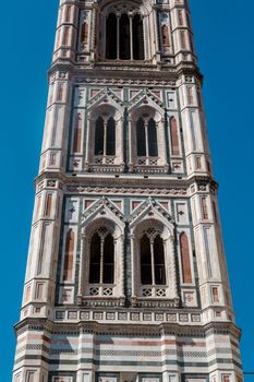 Close up detailed view of belfry of Santa Maria Del Fiore, famous Florence Duomo, with detailed sculptures of renaissance time.
