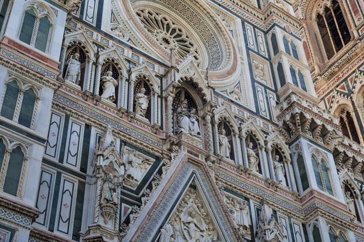 Close up detailed view of Santa Maria Del Fiore, famous Florence Duomo, with detailed sculptures of renaissance time.