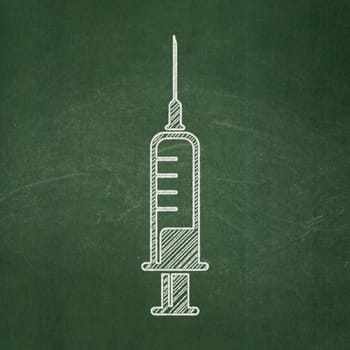 Health concept: Syringe icon on Green chalkboard background