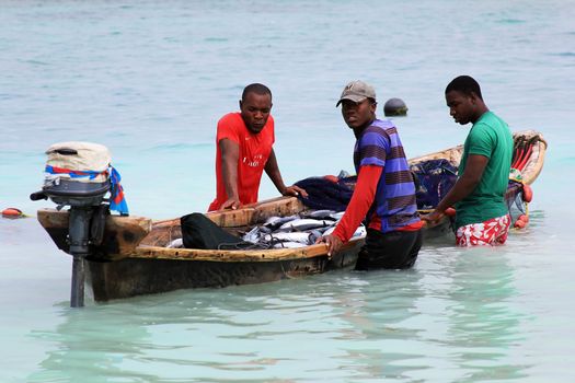 Zanzibar, Tanzania - January 7, 2016: Traditional fish market on the beach in Nungwi. Zanzibar