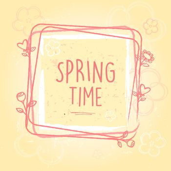 spring time text in frame with flowers and hearts over beige old paper background