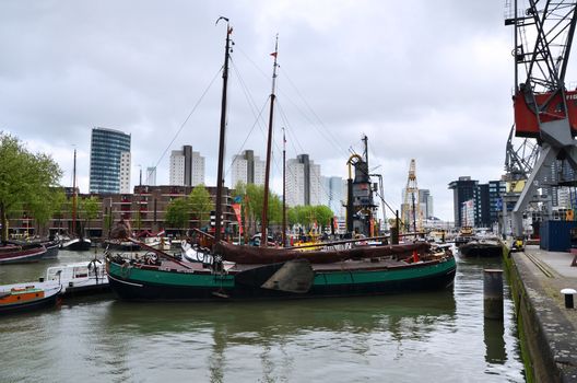 Rotterdam, Netherlands - May 9, 2015: People at Leuvehaven district in Rotterdam, Netherlands. Leuvehaven is Rotterdam's oldest sea port.