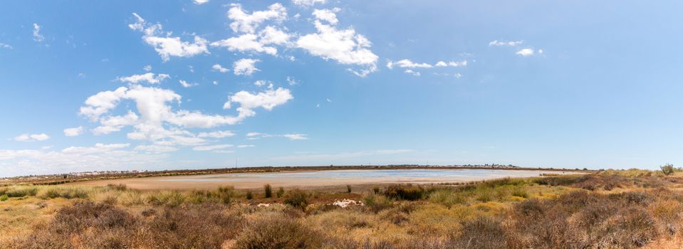 Wide view of the Ria Formosa marshlands located in the Algarve, Portugal.