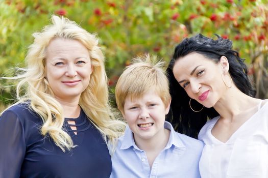 Portrait of two European women with one blonde boy