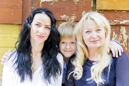 Portrait of two European women with one blonde boy