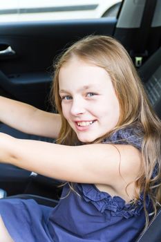 Portrait of cute girl with blond hair