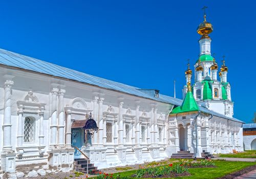 Courtyard white orthodox monastery in a sunny summer day