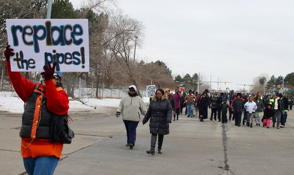 USA, Flint: Residents of Flint, Michigan march to the city's water treatment plant, chanting, No pipes, no peace, demanding swift restoration of drinkable water on February 19, 2016. Reverend Jesse Jackson and the Rainbow PUSH Coalition led the march.