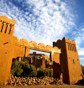 africa  in histoycal maroc  old construction  and the blue cloudy  sky