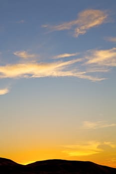 sunrise  in the colored sky white soft clouds and abstract background