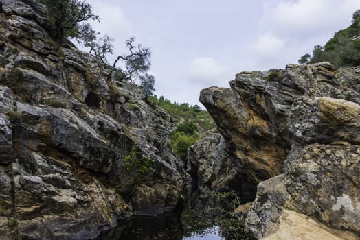 small river with pond in nature portugal near odemira called pego des pias