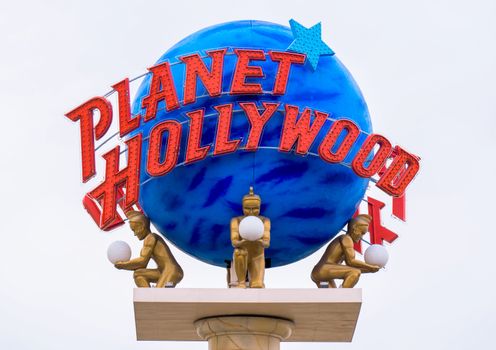 LAS VEGAS, NV/USA - FEBRUARY 14, 2016: Planet Hollywood exterior sign and logo at The Forum Shops at Caesars. Planet Hollywood International, Inc. is a theme restaurant.