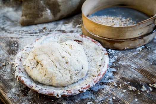 Bread kneaded by hand from organic flour ready to be baked.