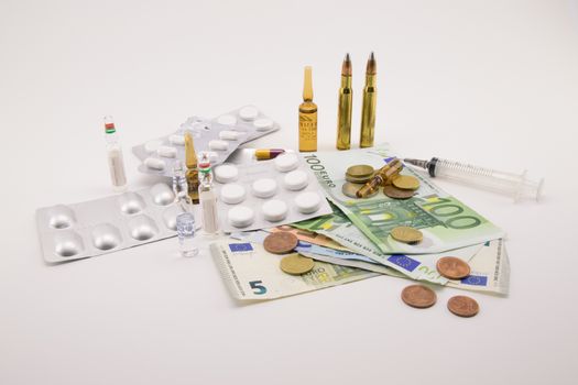 composition with euros, bullets, drugs on white background