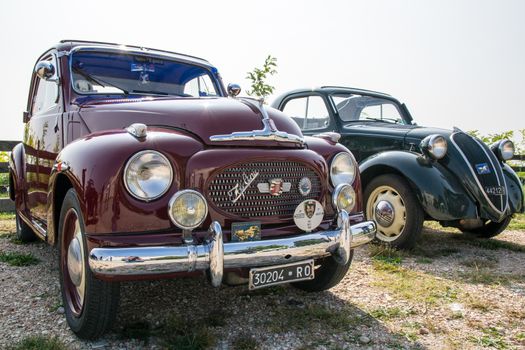 VERONA, ITALY - SEPTEMBER 27: Topolino Autoclub Italia organizes a gathering on Lake Garda Sunday, September 27, 2014. Cars and enthusiasts from all over Italy.