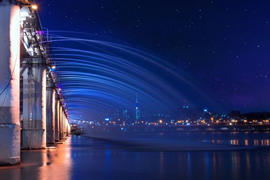 Rainbow fountain show and Milky way at Banpo Bridge in Seoul, Soth Korea.