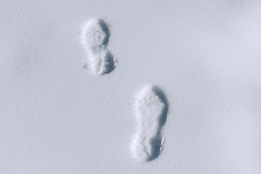 Footprints in snow.
