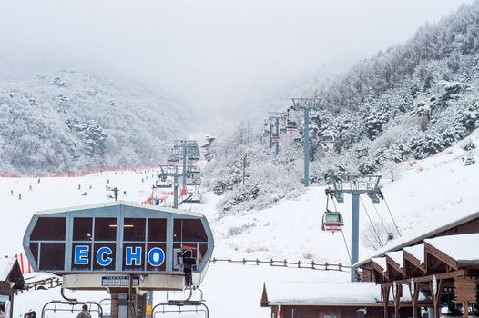 DEOGYUSAN,KOREA - JANUARY 23: Skiers and Tourists in Deogyusan Ski Resort on Deogyusan mountains,South Korea on January 23, 2015.