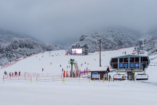 DEOGYUSAN,KOREA - JANUARY 23: Skiers and Tourists in Deogyusan Ski Resort on Deogyusan mountains,South Korea on January 23, 2015.
