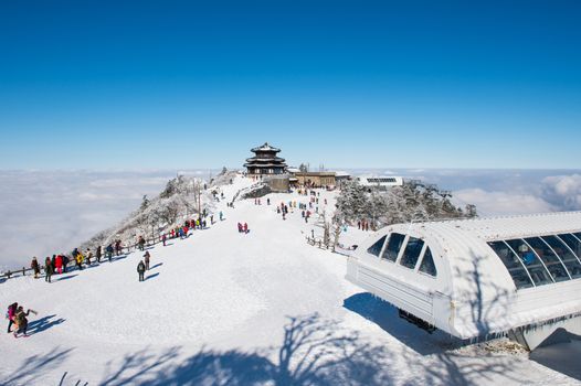 DEOGYUSAN,KOREA - JANUARY 23: Tourists taking photos of the beautiful scenery and skiing around Deogyusan,South Korea on January 23, 2015.