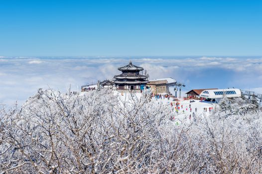 DEOGYUSAN,KOREA - JANUARY 23: Tourists taking photos of the beautiful scenery and skiing around Deogyusan,South Korea on January 23, 2015.