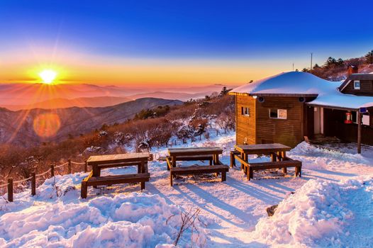 Sunrise with beautiful Lens Flare at Deogyusan mountains in winter,South Korea.