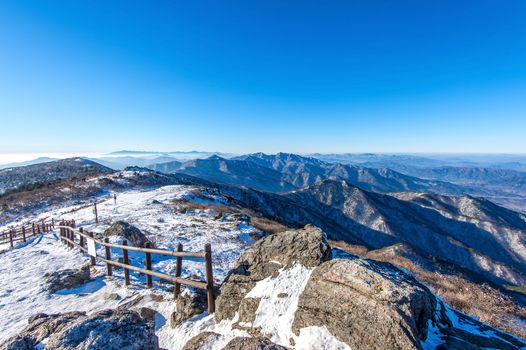 Peak of Deogyusan mountains with morning fog in winter, South Korea.
