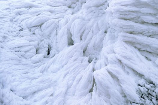 Wind painted Snow Texture Pattern on stone Background, Winter background.