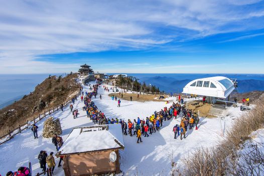 DEOGYUSAN,KOREA - JANUARY 1: Tourists taking photos of the beautiful scenery and skiing around Deogyusan,South Korea on January 1, 2016.