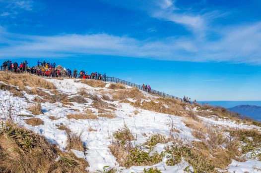 DEOGYUSAN,KOREA - JANUARY 1: Tourists taking photos of the beautiful scenery and skiing around Deogyusan,South Korea on January 1, 2016.