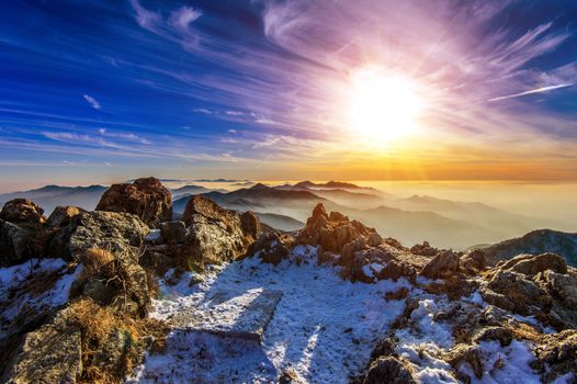 Winter landscape with sunset and foggy in Deogyusan mountains, South Korea.