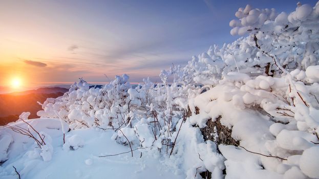 Sunrise on Deogyusan mountains covered with snow in winter,South Korea.
