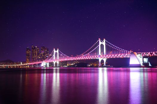 Gwangan Bridge at night with star in Busan, South Korea.