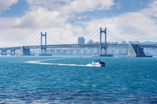 Gwangan bridge and speed boat in Busan,Korea