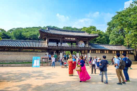 SUWON, SOUTH KOREA - JULY 5: Korean Folk Village,Traditional Korean style architecture and Tourists in Korean Folk Village on July 5, 2015 in Suwon, South Korea.