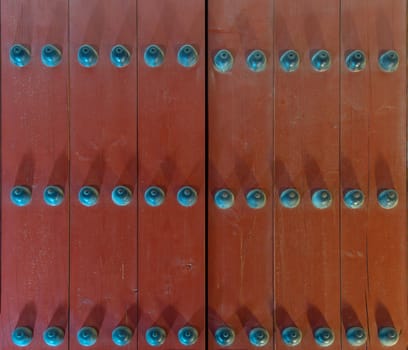 Wooden door of Geyongbokgung Palace at night in Seoul, South Korea.