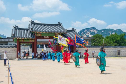 SEOUL, SOUTH KOREA - JULY 5: Soldier with traditional Joseon dynasty uniform guards the Gyeongbokgung Palace on July 5, 2015 in Seoul, South Korea.