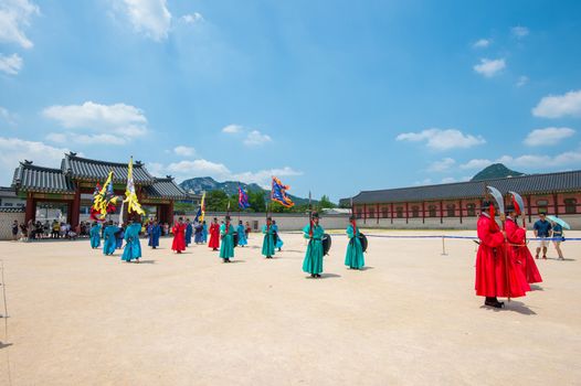 SEOUL, SOUTH KOREA - JULY 5: Soldier with traditional Joseon dynasty uniform guards the Gyeongbokgung Palace on July 5, 2015 in Seoul, South Korea.