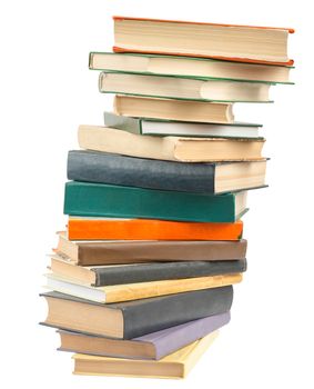 Pile of colorful books isolated on white background, closeup