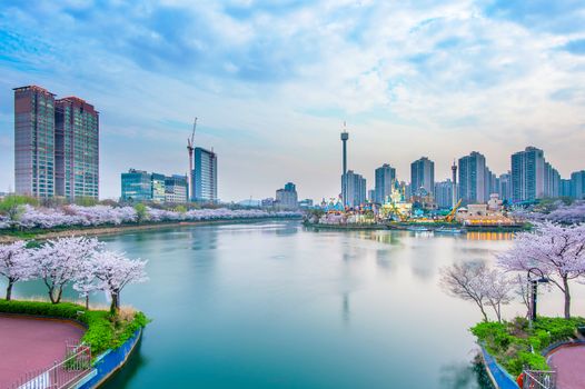 Korea cityscape with Lotte world and Cherry Blossom Festival in Spring,Seoul in South Korea
