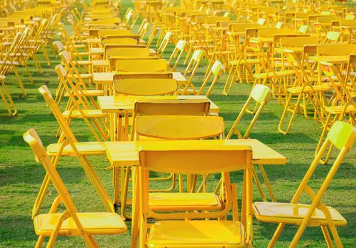 group of outdoor yellow table and chair