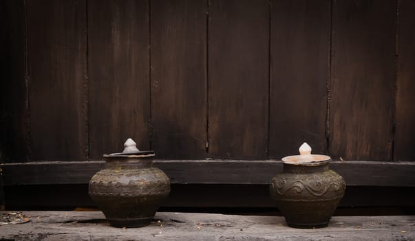 Pottery drinking water jar from northen thailand background