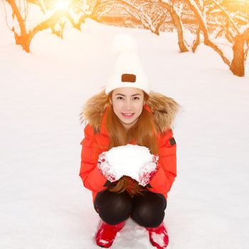 Beautiful young woman in the winter.